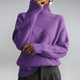 Women's geometric turtleneck sweater with ribbed panels and long sleeves