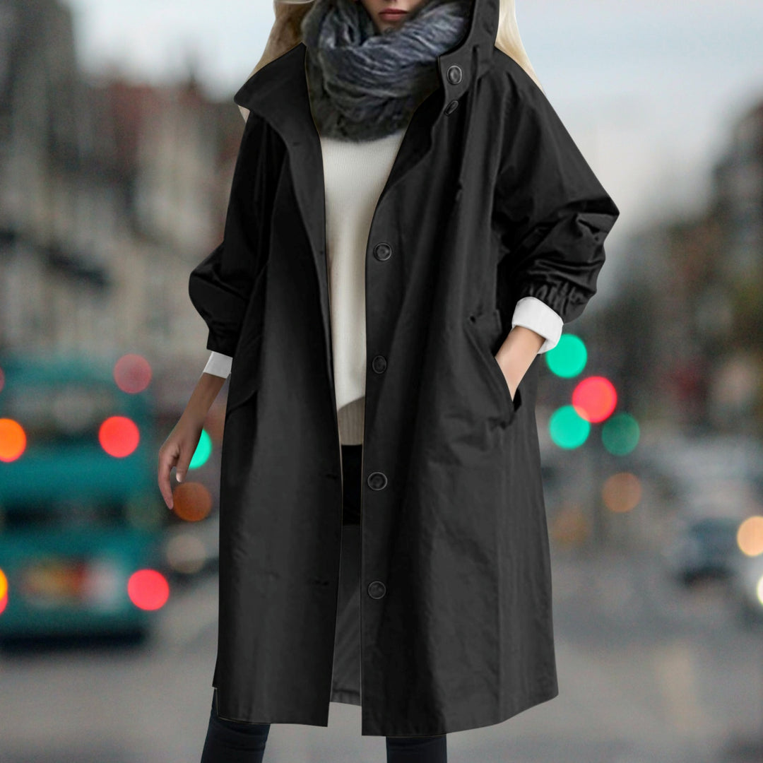 Women's hooded longline rain coat with button front and gathered cuffs