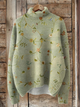 Women's oversized floral turtleneck poncho sweater with batwing sleeves