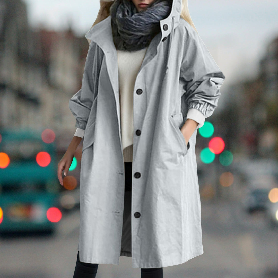 Women's hooded longline rain coat with button front and gathered cuffs