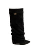 Women's black knee-high boots with slouchy shaft and gold buckle trim at calf