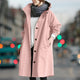 Women's hooded longline rain coat with button front and gathered cuffs