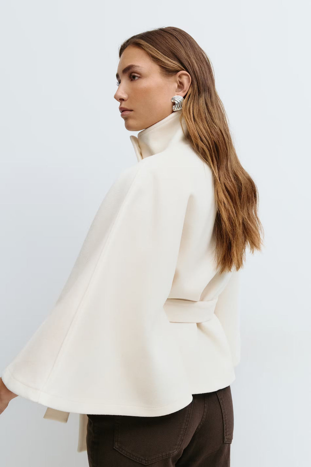 Women's belted cape coat with high collar and button front