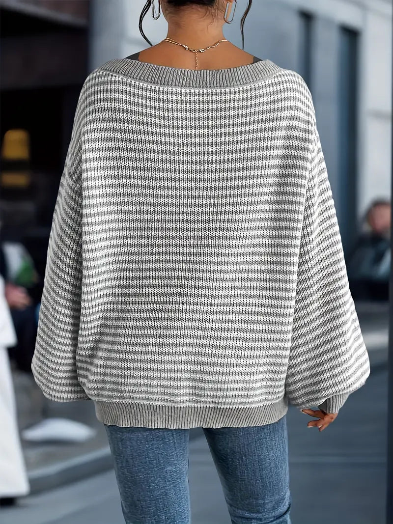Women's striped knit sweater with crew neckline and long sleeves