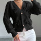 Women's ribbed V-neck cardigan with bow details and button front
