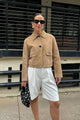 Women's beige cropped jacket with pointed collar and front flap pockets