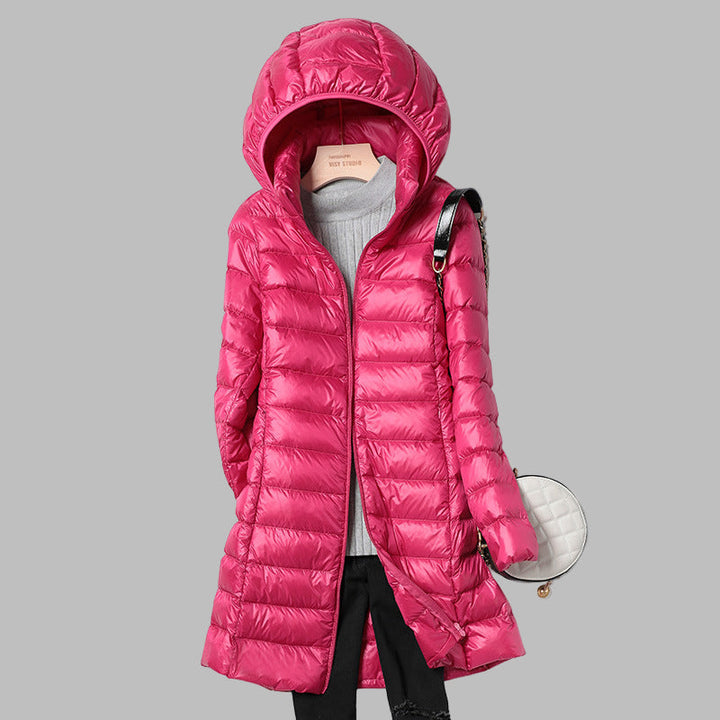 Women's longline quilted puffer coat with hood and front zipper