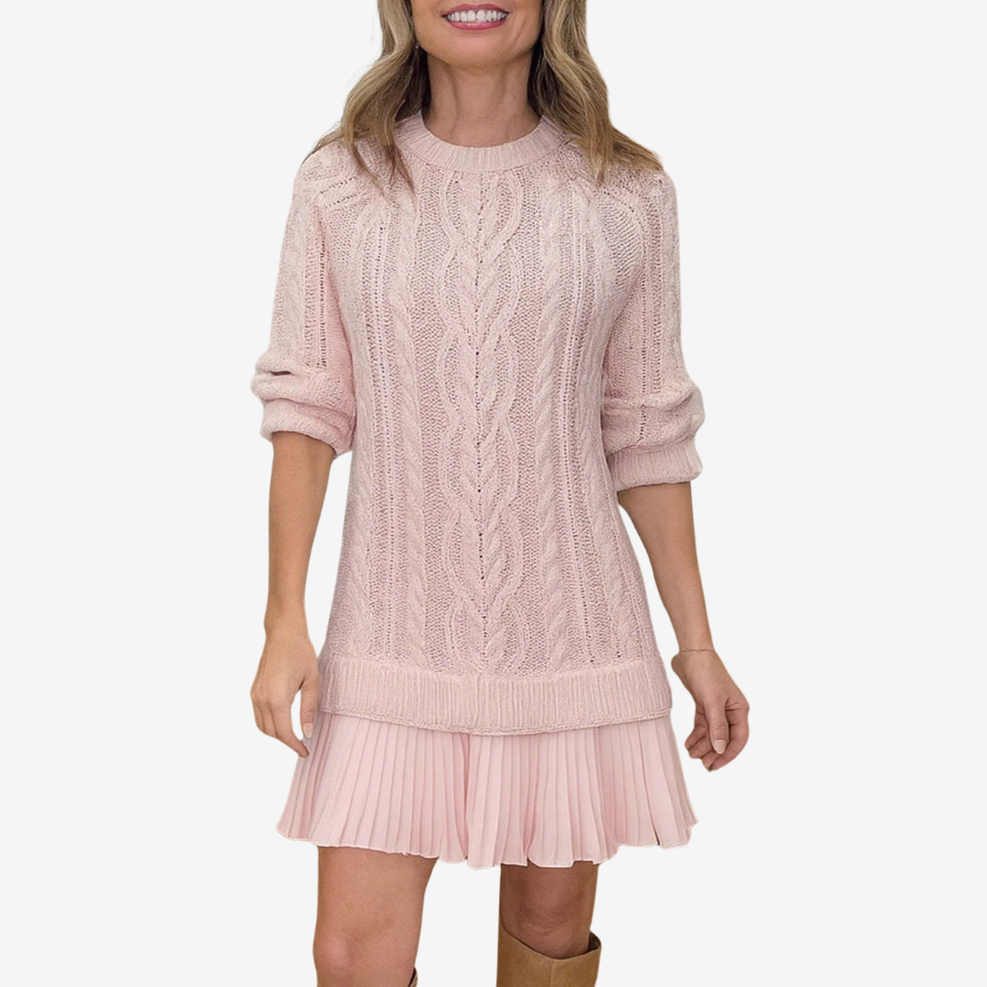 Women's cable knit dress with crew neck, long sleeves and pleated hem
