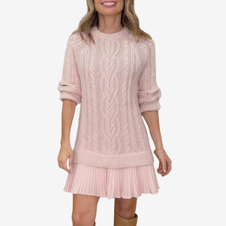 Women's cable knit dress with crew neck, long sleeves and pleated hem