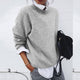 Women's knit cardigan with asymmetric button front and long sleeves