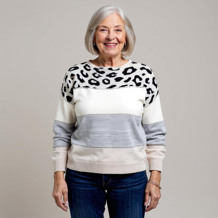 Women's leopard print color block sweater with crew neckline and long sleeves