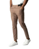 Men's slim tapered chino trousers shown in black and navy with button waist and ankle-length legs