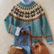 Women's blue Fair Isle crew neck sweater with long sleeves and patterned trim