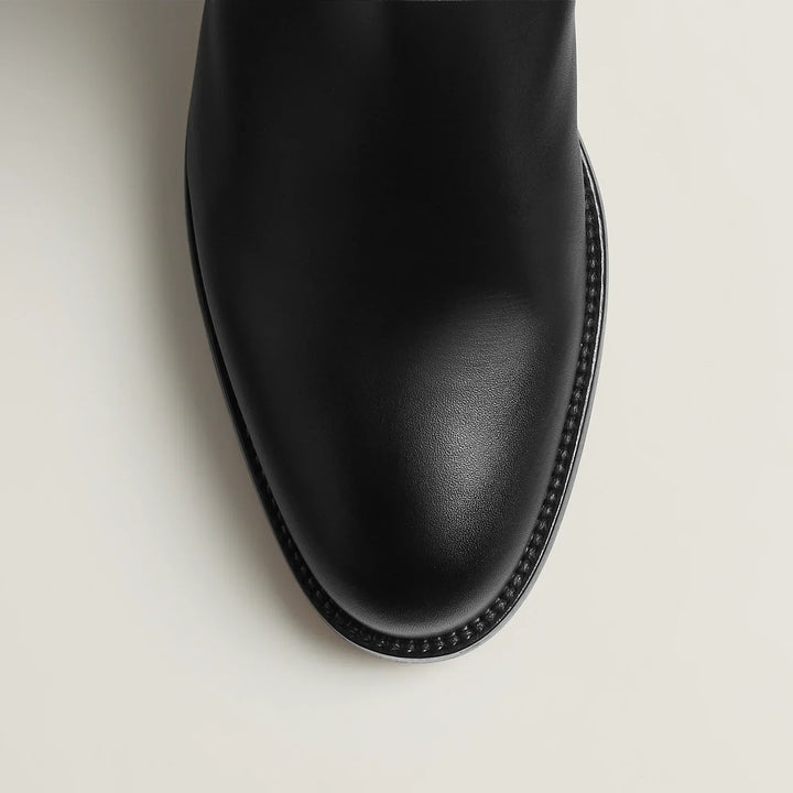 Women's tall knee-high riding boots with strap detail
