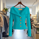 Women's ribbed button front cardigan with shawl collar, long sleeves and front pockets
