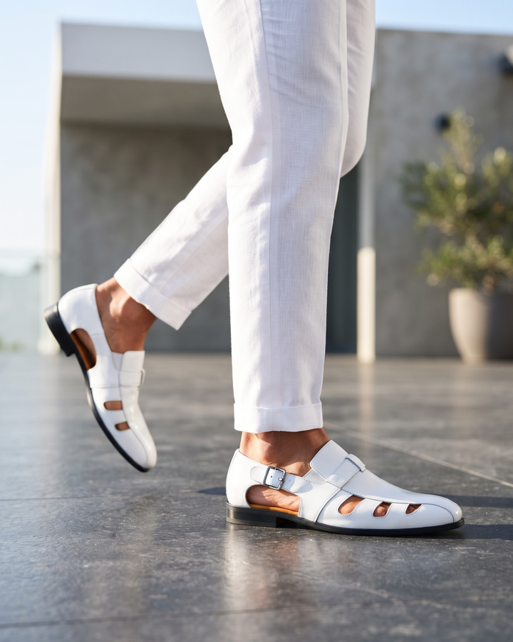Monk-strap dress loafer with cutout vamp detailing and buckle fastening