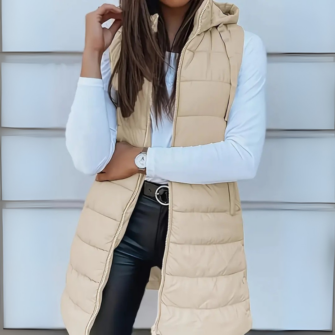 Women's long sleeveless hooded quilted puffer vest with zip front