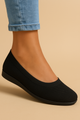 Women's knitted ballet flat with round toe and low wedge sole