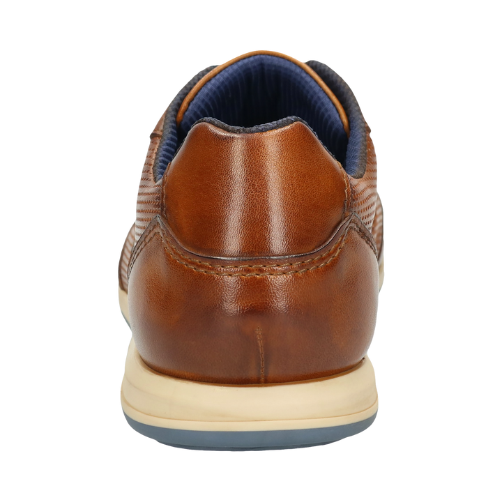 Cognac leather lace-up sneaker with textured panels and navy side stripe