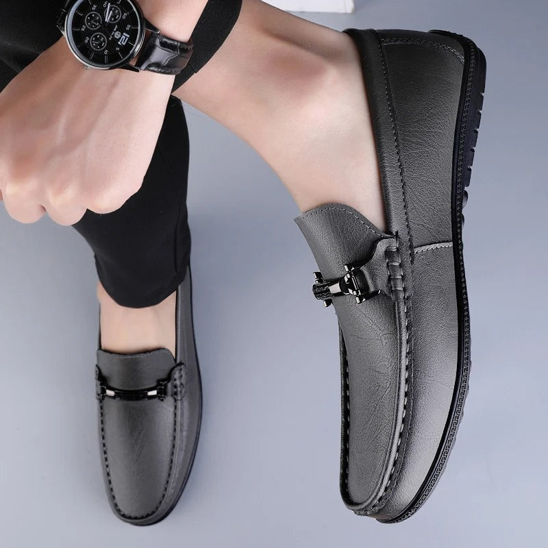 Men's slip-on loafers with moc toe and decorative vamp strap