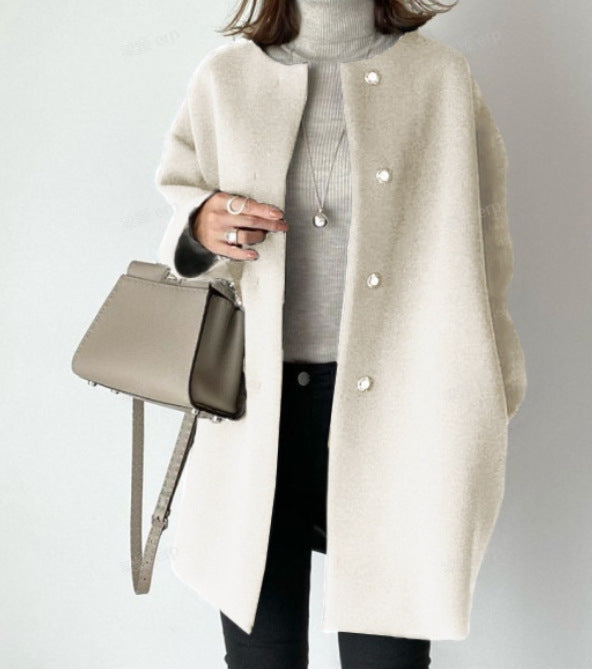 Women's long knitted cardigan with round neckline, long sleeves and button front