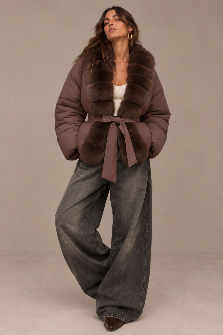 Women's puffer jacket with textured brown trim and front waist tie