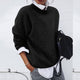 Women's knit cardigan with asymmetric button front and long sleeves