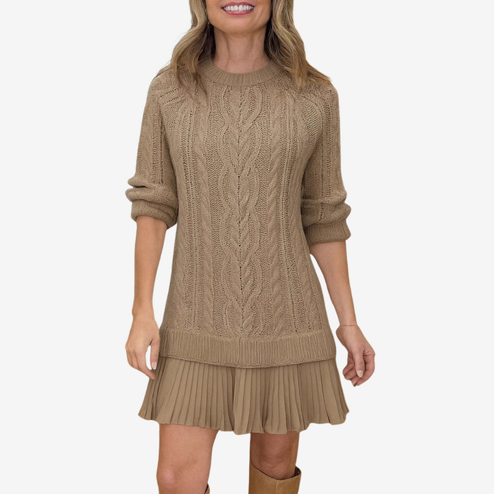 Women's cable knit dress with crew neck, long sleeves and pleated hem