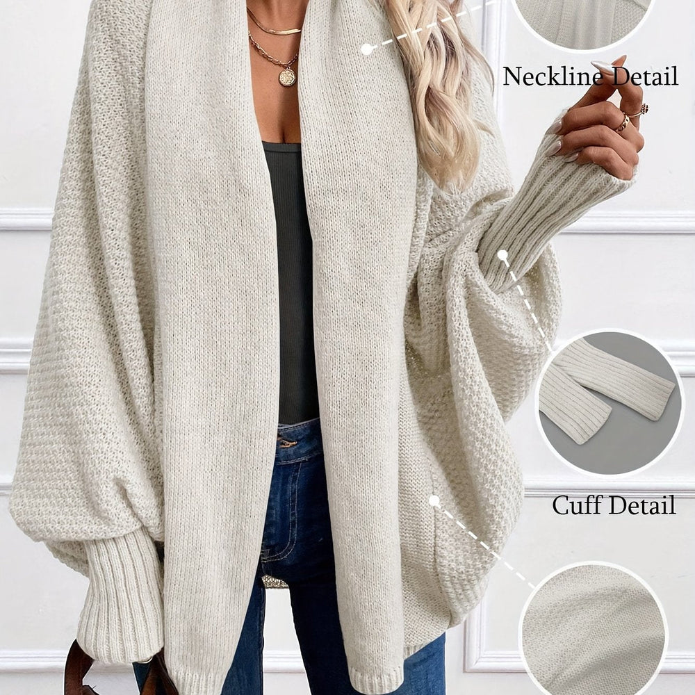 Women's draped open-front cardigan with shawl collar and ribbed cuffs