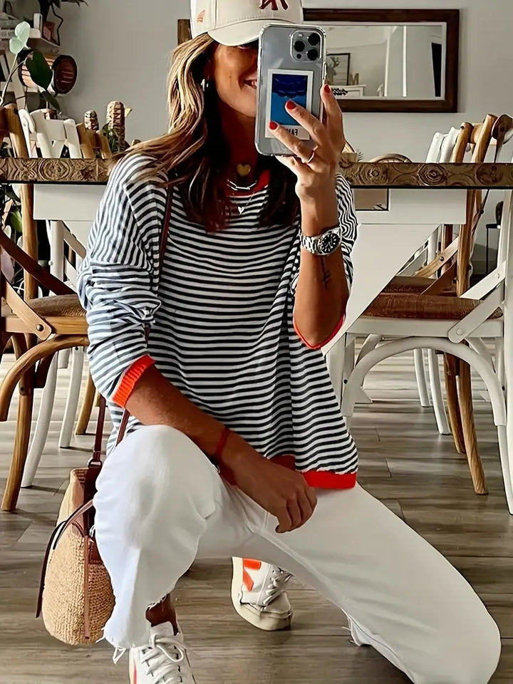 Women's striped turtleneck jumper with orange ribbed trim