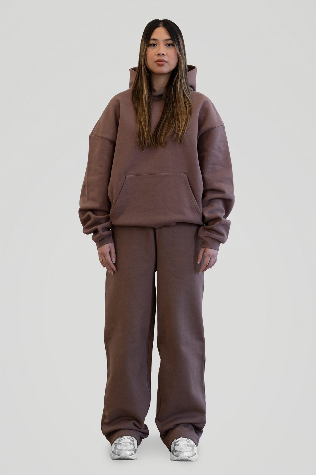 Brown unisex pullover hoodie with hood, long sleeves and front kangaroo pocket