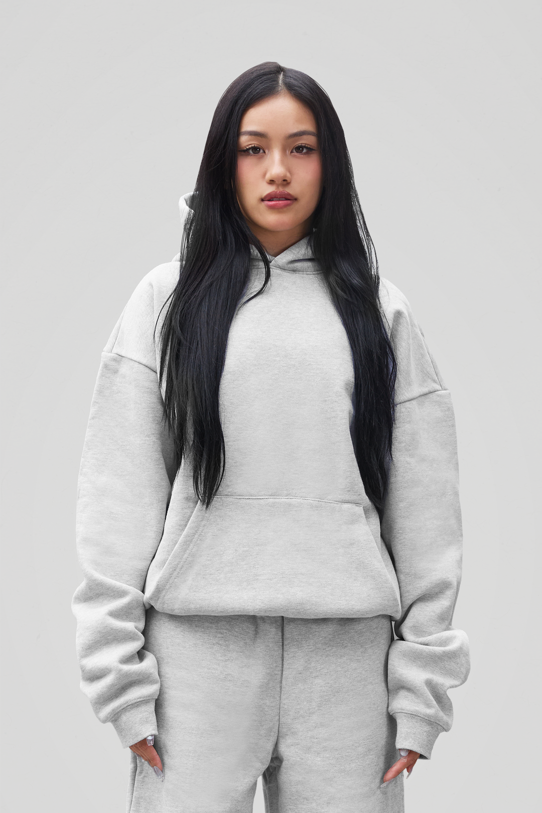 Women's gray oversized pullover hoodie with kangaroo pocket