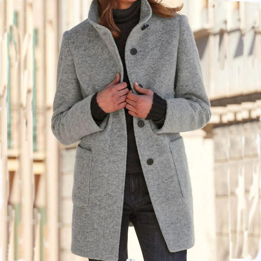 Women's mid-length button front coat with stand collar and patch pockets
