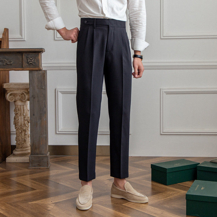 High-waisted pleated straight-leg trousers with belt