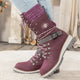 Women's lace-up snow boots with buckle strap and lug sole