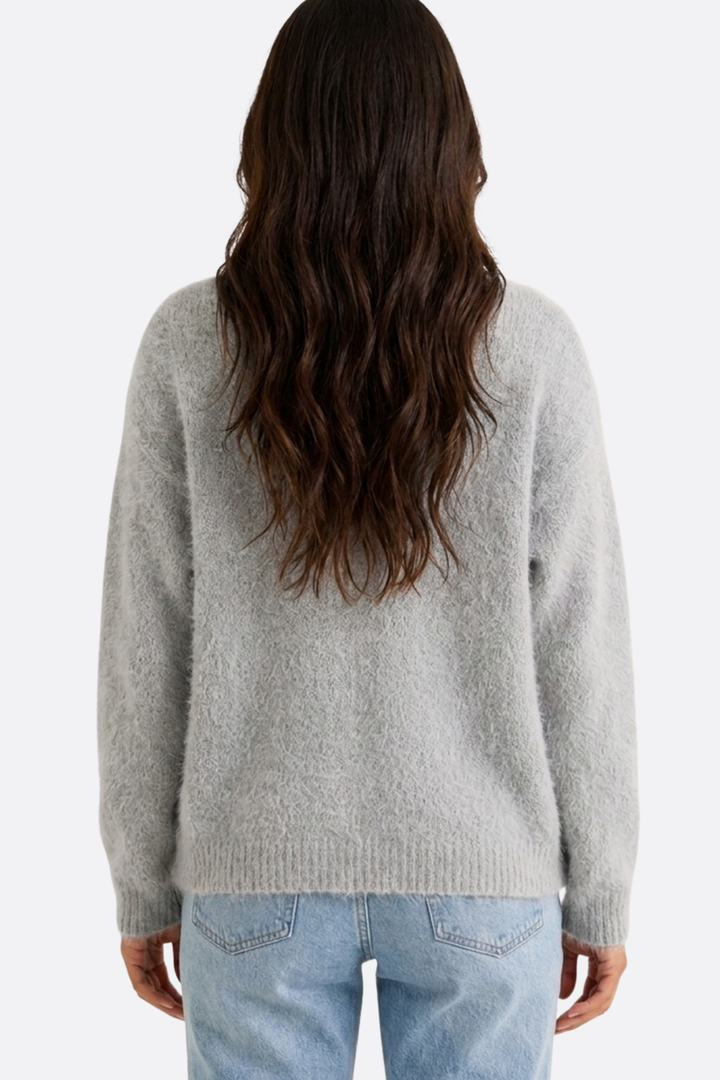 Women's textured V-neck cardigan with long sleeves and button front
