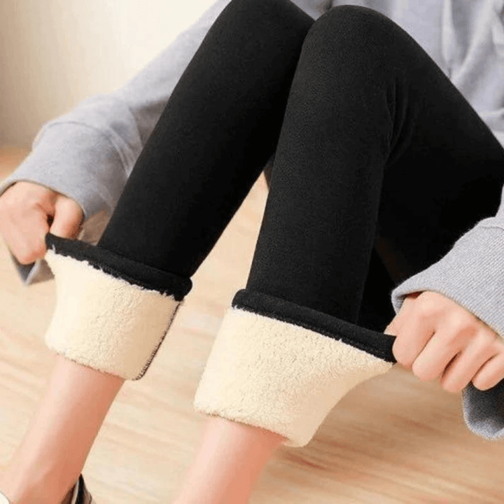 Women's dark fleece-lined leggings with a high waistband