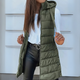 Women's long sleeveless hooded quilted puffer vest with zip front