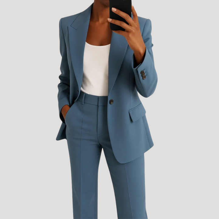 Women's tailored two-piece suit with notched-lapel blazer and straight-leg trousers