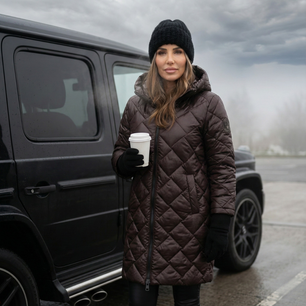 Women's quilted hooded long coat shown in pink and black