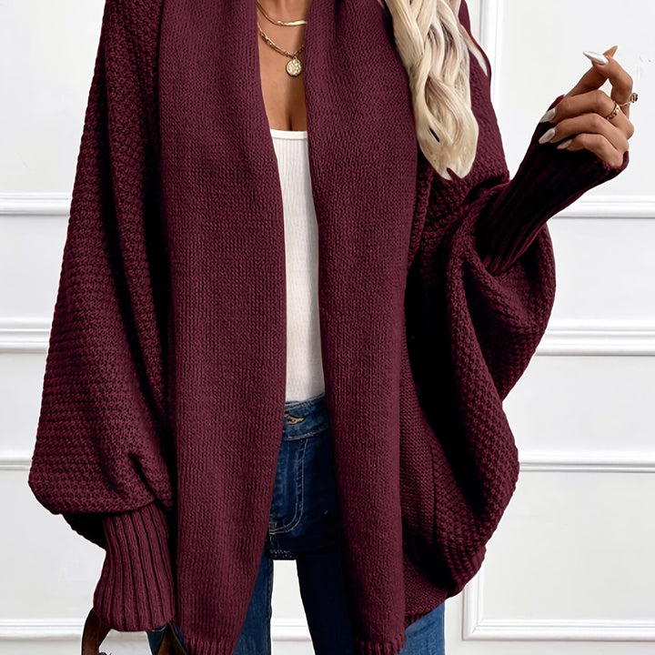 Women's draped open-front cardigan with shawl collar and ribbed cuffs