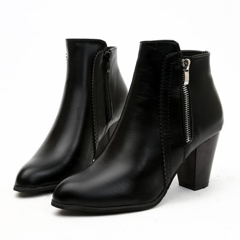 Women's heeled ankle boots with pointed toe, side zipper and high block heel