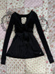 Women's long-sleeve wrap babydoll top with V-neck and tie waist