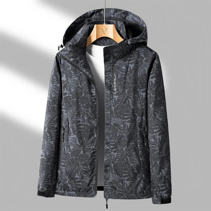 Women's hooded leaf print windbreaker jacket with front zip pockets
