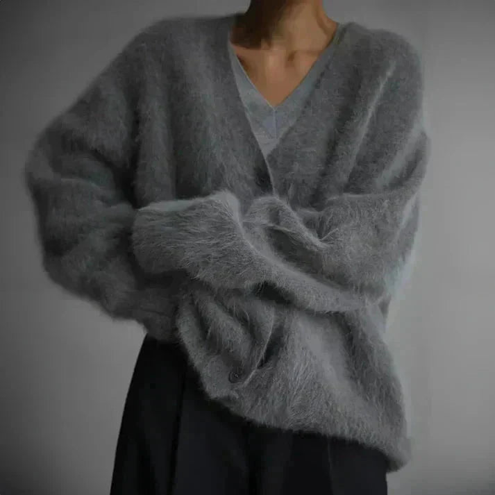 Women's fuzzy knit V-neck cardigan with button front and long sleeves