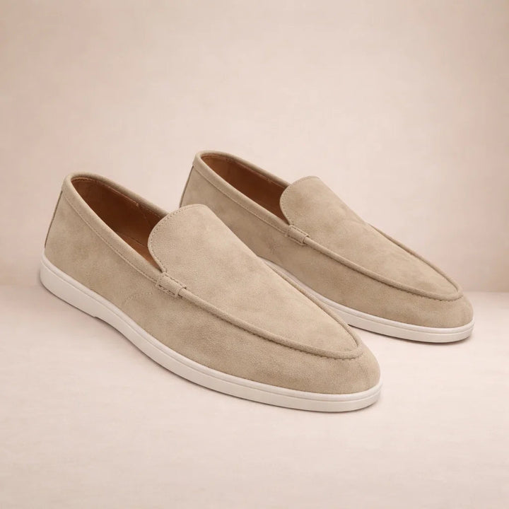 Men's casual slip-on loafers with moc toe stitching and flat white soles