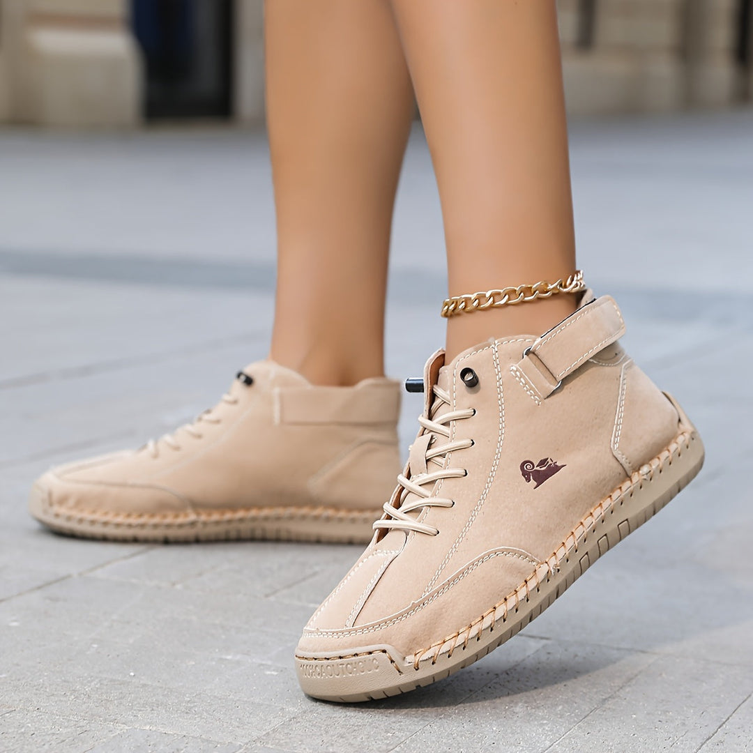 Ankle boots with lace-up fronts, buckle straps and moc toes