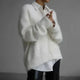 Women's fuzzy knit V-neck cardigan with button front and long sleeves