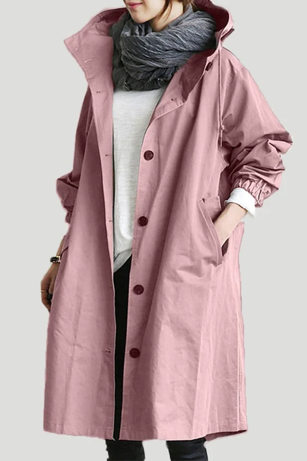 Women's oversized hooded mid-length trench coat with button front and side pockets