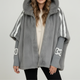 Women's hooded faux fur parka with contrasting striped sleeves